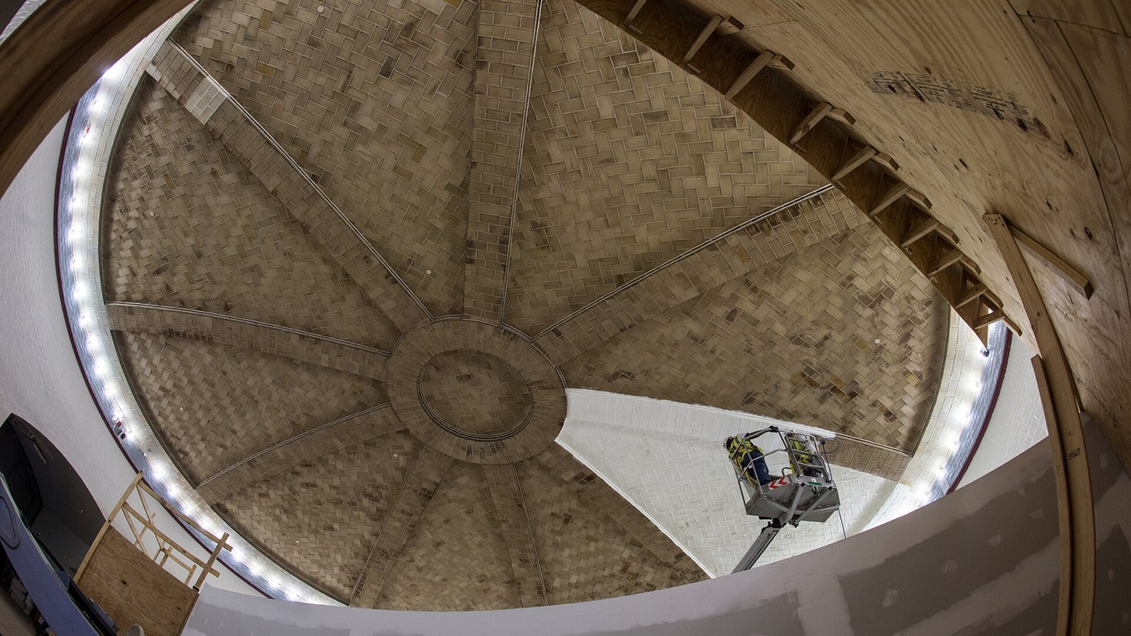 Workers spray a cleaning agent on the Guastavino tile ceiling in the Cannon Building's basement rotunda. Phase 1 of the Cannon Renewal Project began in January 2017 and is scheduled to be complete in November 2018. The e
