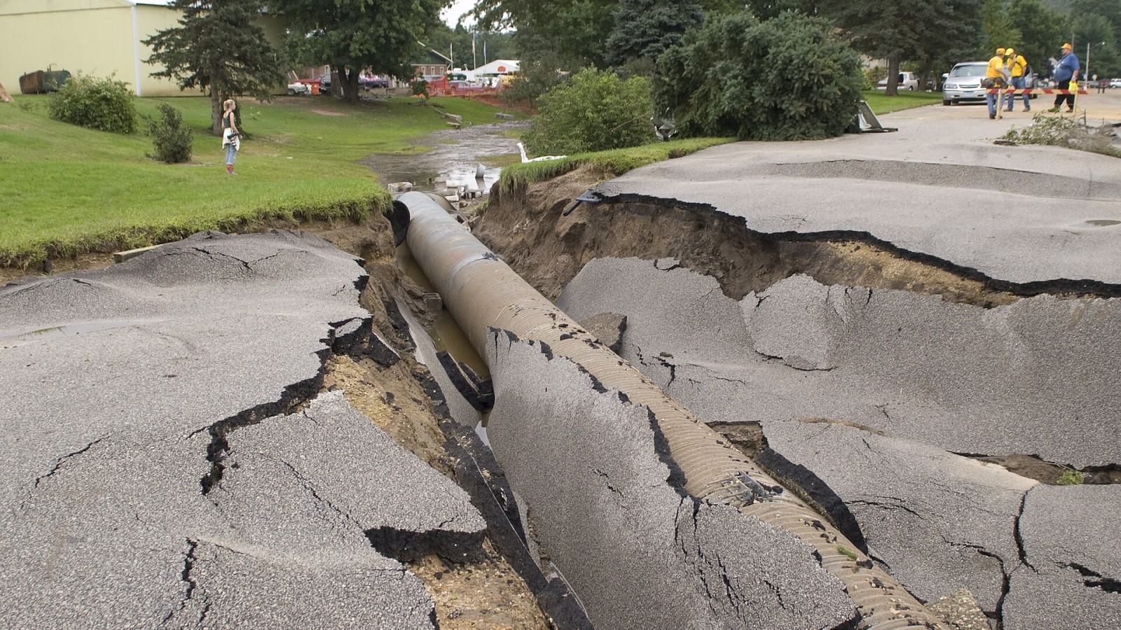 Stockton, MN, August 23, 2007 -- Damage to a road caused by flood water. The road collapsed around a drainage pipe that ran under the road. FEMA is working with state and local representatives in Minnesota to assess and