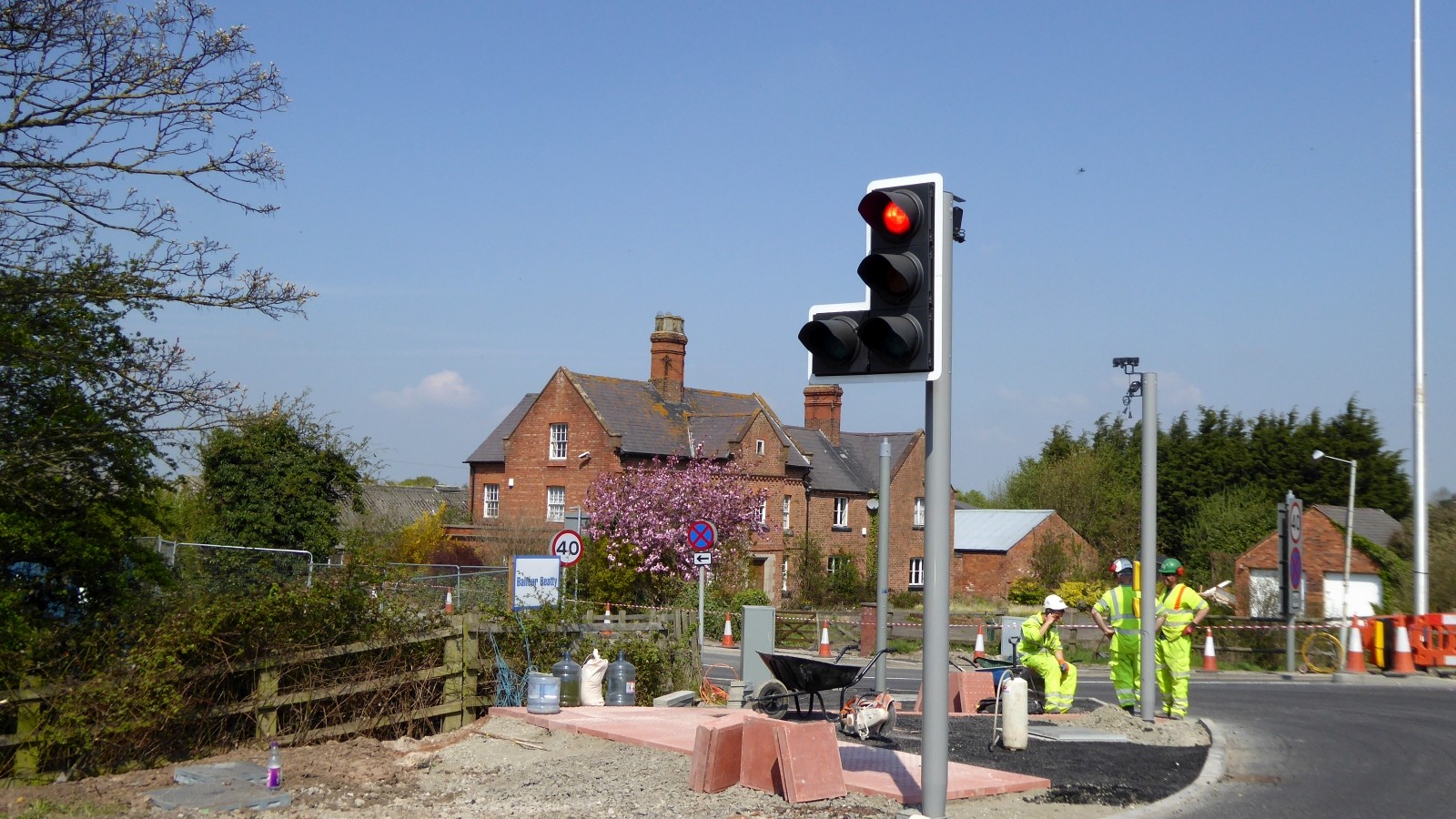 Construction workers improving the junction at Two Mile House