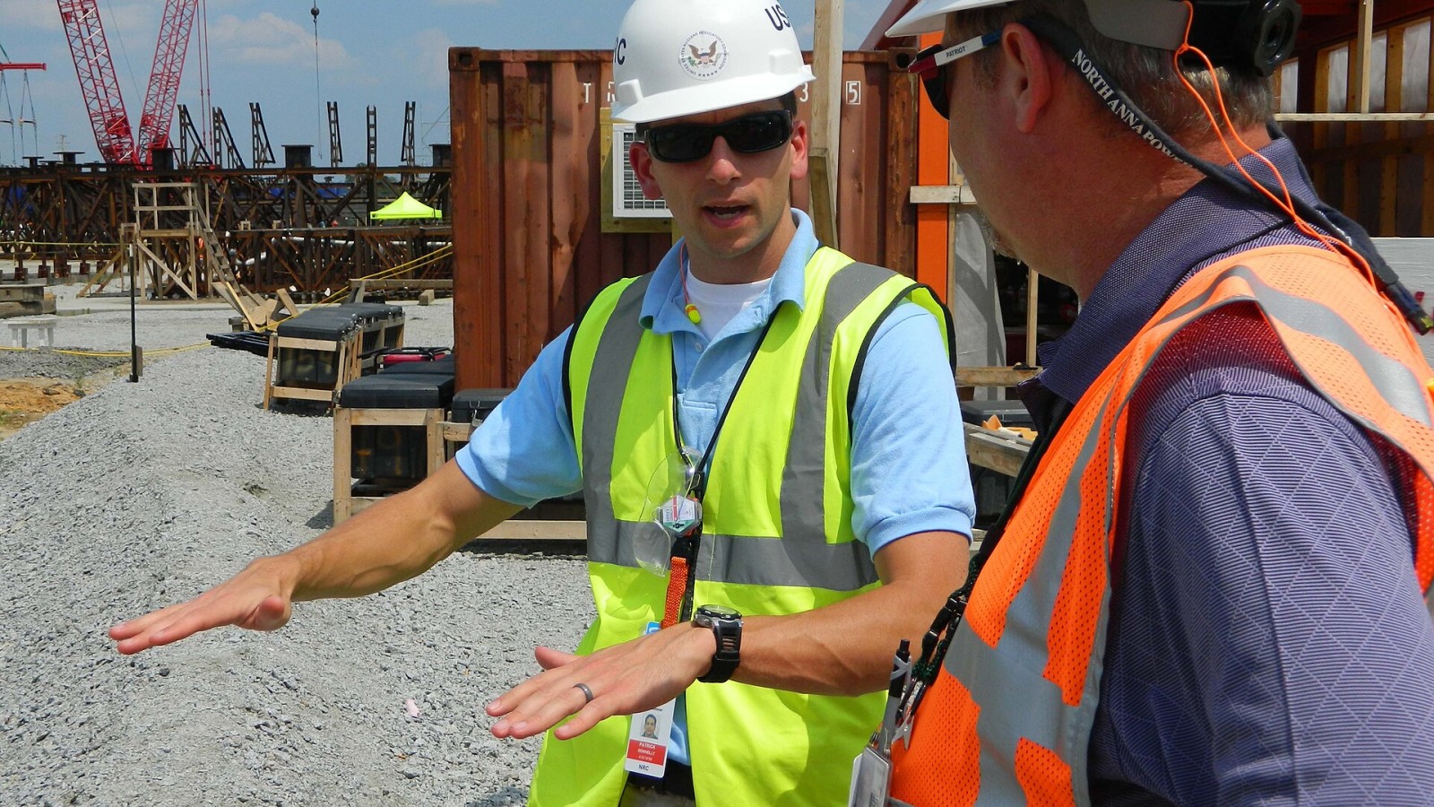 Patrick Donnelly, (left) one of the NRC resident inspectors for the Summer plant construction site, explains the resident inspection activities to Tom Fredette from the NRC’s Office of New Reactors. There are three NRC c