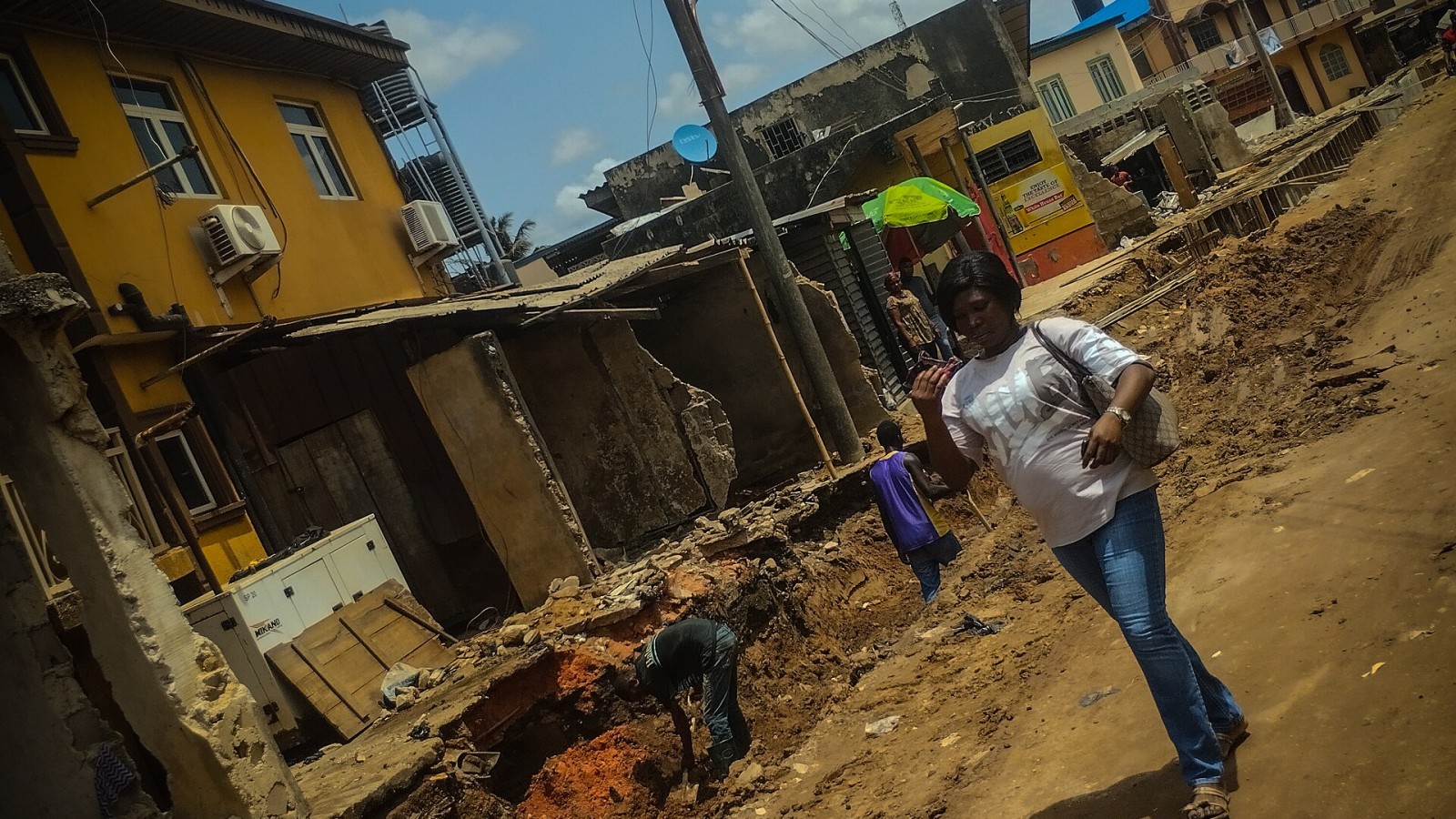 The engineers working at the road construction site