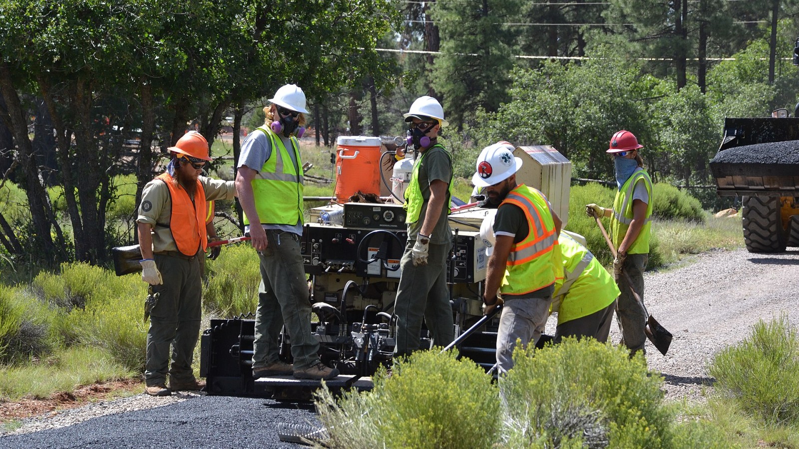 Workers look back at their progress. Between August 10 to September 10, 2016 the Greenway Trail between the IMAX Theater parking area in Tusayan and Center Road in Grand Canyon National Park will be closed while Grand Ca