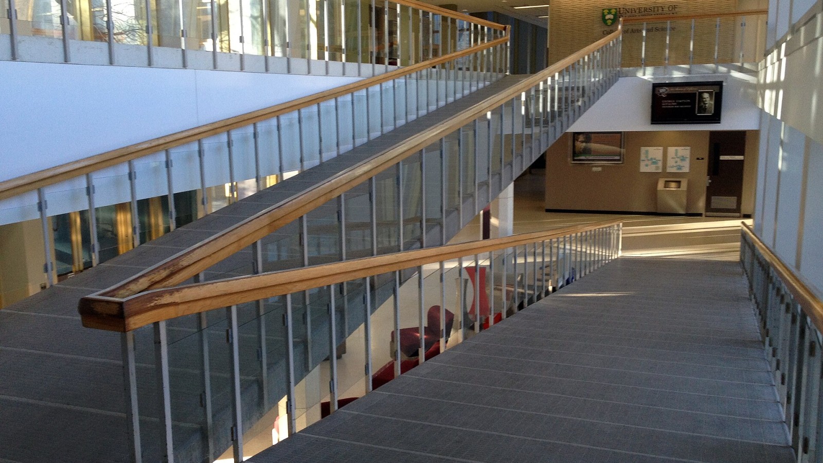 Inside the main entrance to the Arts Building is a ramp from the first to the second floors, in place of a staircase.