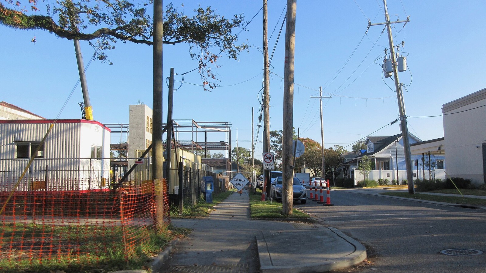 Old Carrollton Town Hall site contruction, New Orleans, 22 November 2021. Construction on complex for decades housing schools, originally 19th century Carrollton Town Hall & Courthouse. The historic main building is to b