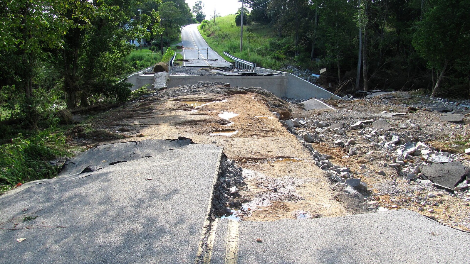 Flood damage at the bridge over Blackburn Fork along Pippin Road in northern Putnam County, Tennessee, USA. This flood occurred on the morning of August 18, 2010. The floodwaters moved from left to right in the photograp