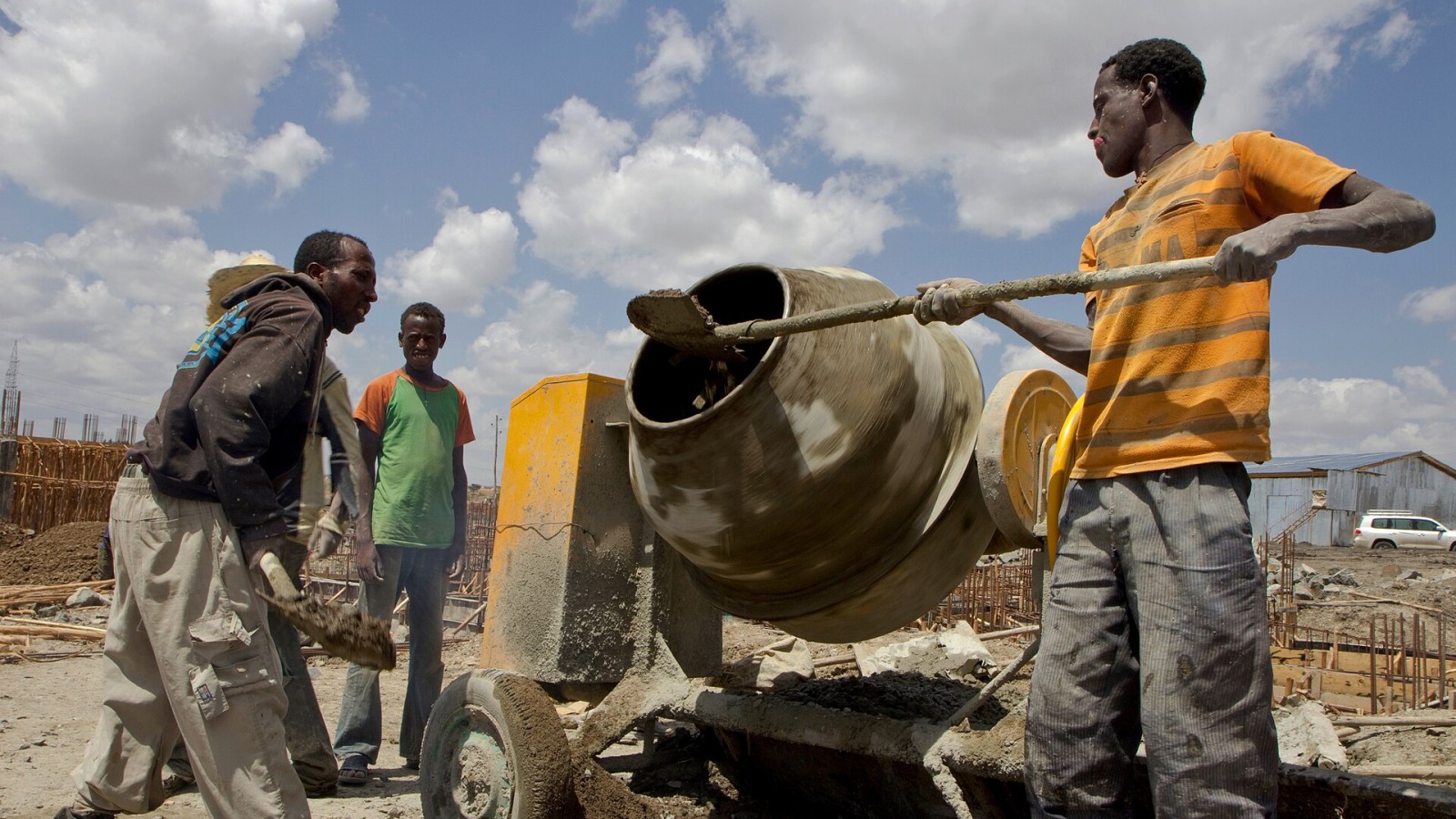 Beyond the factory gates, the building boom the cement factory is helping to fuel is providing jobs for countless construction workers across Ethiopia. With investment from the UK, the National Cement Share Company is on