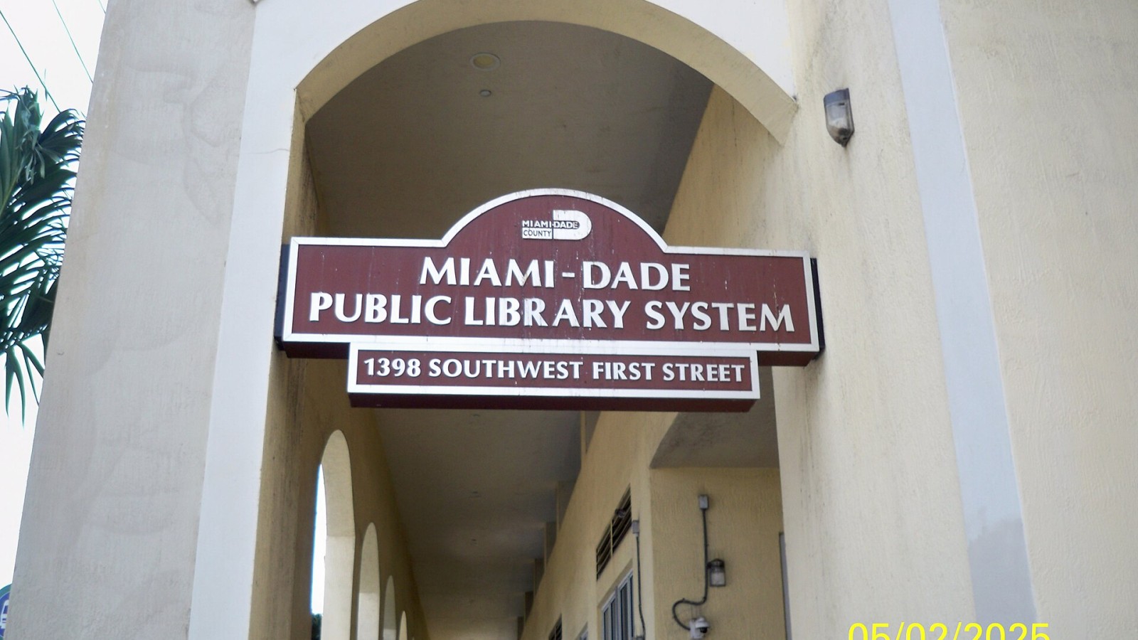 Entrance walkway of hispanic branch part of Miami Dade Public Library System it is wheelchair accessible walkway.