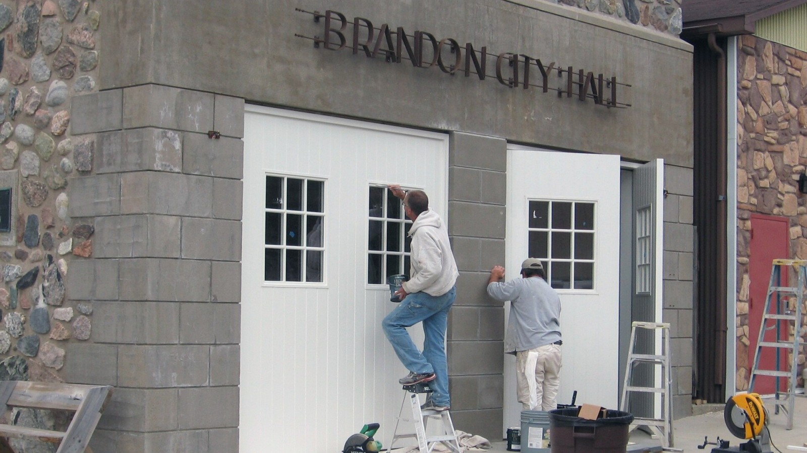 Restoration work on Brandon Auditorium and Fire Hall, Brandon, Minnesota, USA. A unique WPA project constructed of concrete and fieldstone. Now houses the Brandon History Center. This is an image of a place or building t