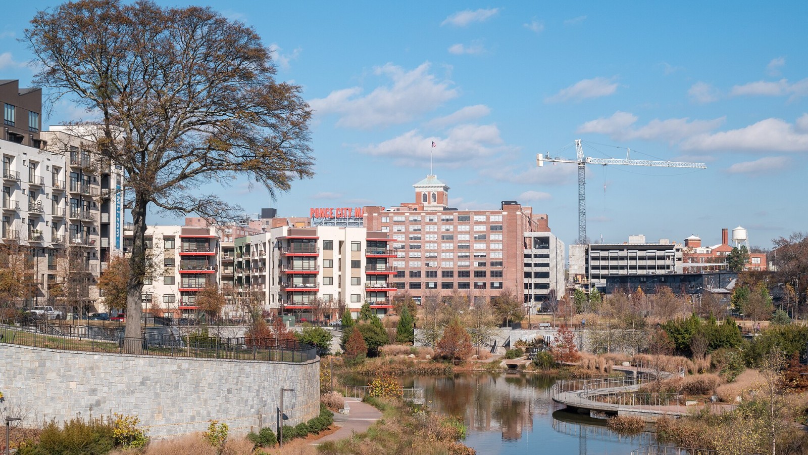 View of Ponce City Market across the Clear Creek Basin stormwater detention pond at Historic Fourth Ward Park in Atlanta, December 2015. Location indicates the vantage point of the photographer.