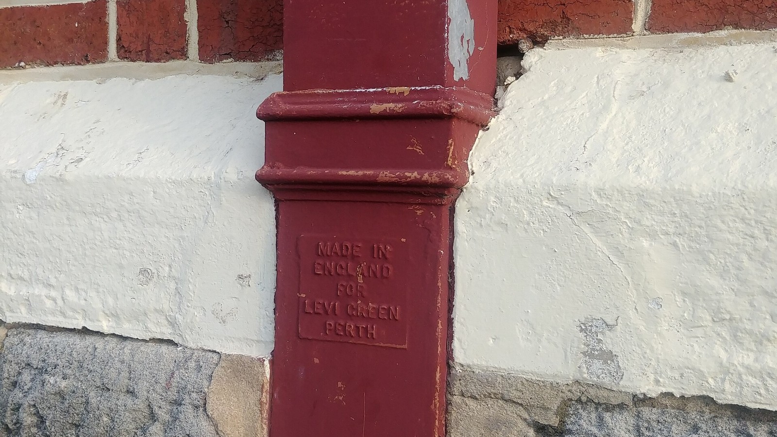 Cast-iron and galvanized tin downpipe, "made in Englad for Levi Green Perth".