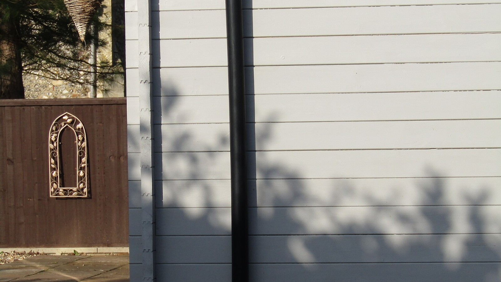 A rainwater down pipe on a shed in the village of Trimingham, Norfolk, United Kingdom.