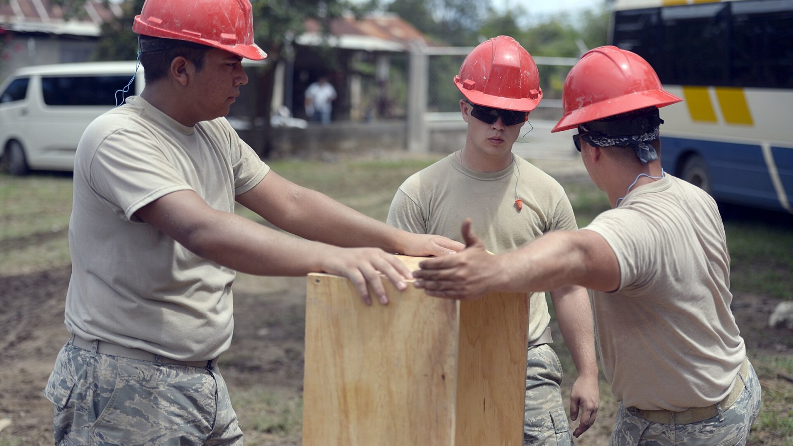 Airmen from the 823rd Expeditionary RED HORSE Squadron out of Hurlburt Field, Fla., create a part of the form, which will make the septic tank top at the Gabriela Mistral primary school site in Ocotes Alto, Honduras, Jun