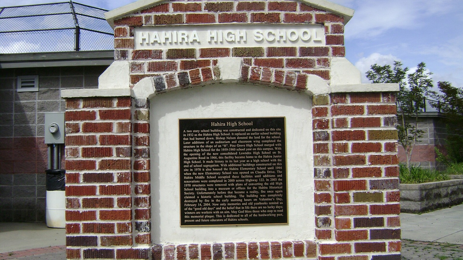 Front of Hahira High School historic plaque in front of the Hahira Middle School Baseball Field in Hahira, Lowndes County, Georgia The plaque reads: A two story school building was constructed and dedicated on this site