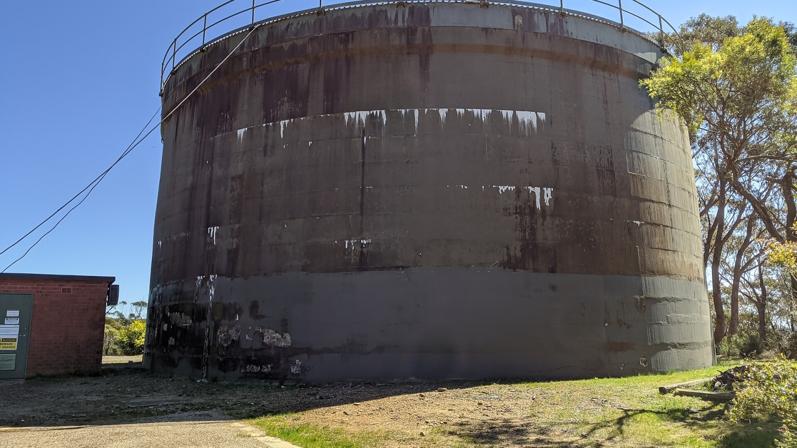 A covered reservoir in Wentworth Falls, NSW Australia on Blaxland Road (reference number WS0389). The facility is operated by Sydney Water and the grounds also service pumping and chlorination facilities.